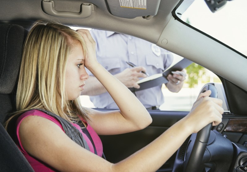 Girl receiving Traffic Violation Citation